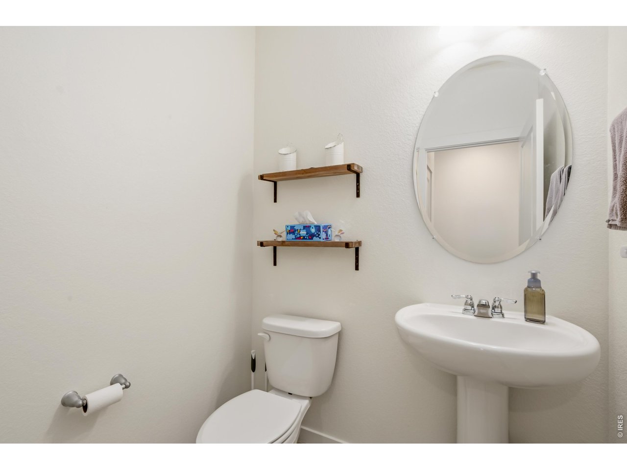352 Bluebird Road Johnstown, CO 80534 - Photo 13 of 26 Main floor powder room