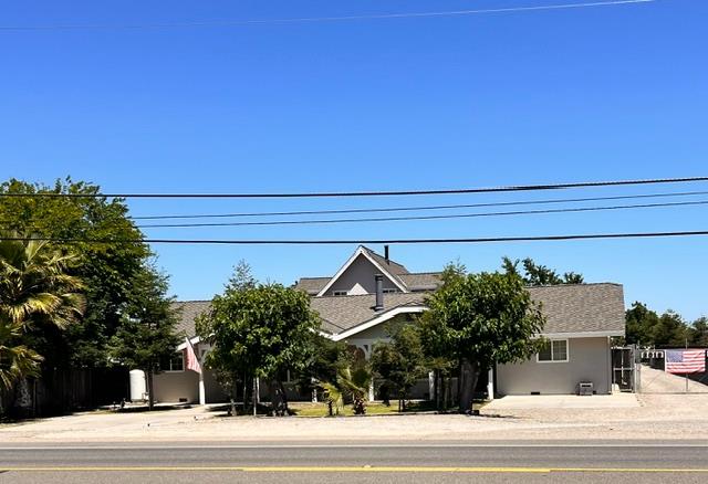 3019 Lathrop Road Manteca, CA 95336 - Photo 1 of 43 a view of a building in the background