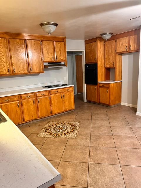 3019 Lathrop Road Manteca, CA 95336 - Photo 17 of 43 a kitchen with stainless steel appliances granite countertop a refrigerator and a sink