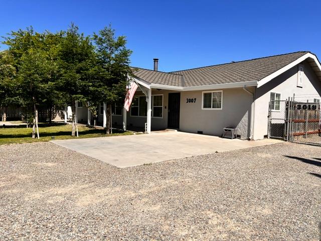 3019 Lathrop Road Manteca, CA 95336 - Photo 3 of 43 a view of a house with a outdoor space