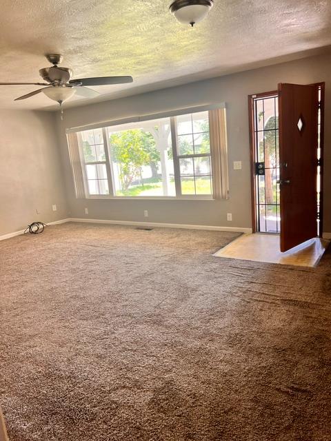3019 Lathrop Road Manteca, CA 95336 - Photo 7 of 43 a view of an empty room with a window