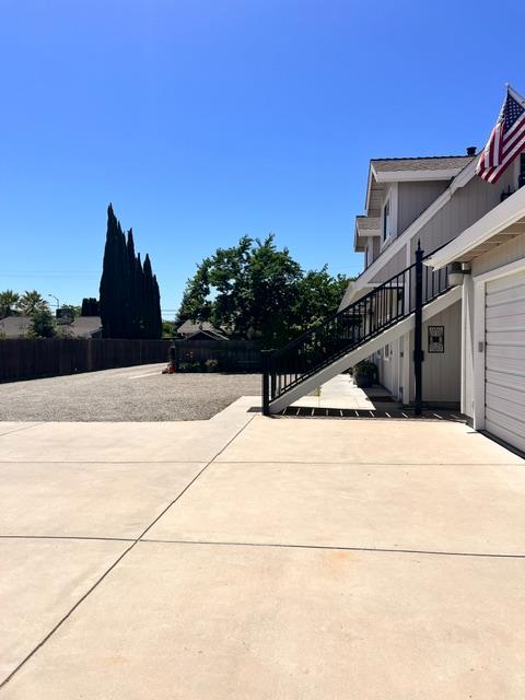 3019 Lathrop Road Manteca, CA 95336 - Photo 10 of 43 a view of a street with a building in the background