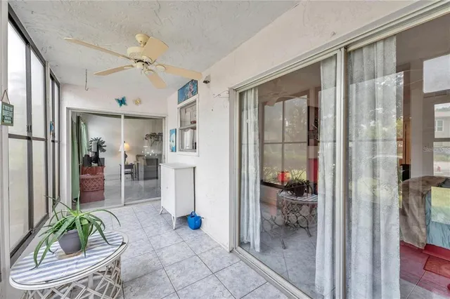 a room with balcony and wooden floor