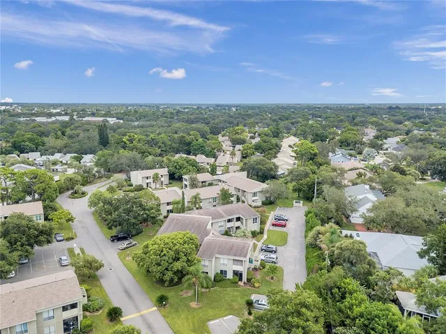 an aerial view of a house with a garden