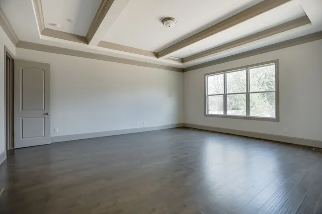 a large white tub sitting in a bathroom
