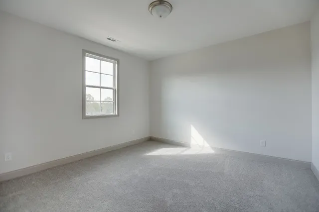 a kitchen that has a sink and cabinets