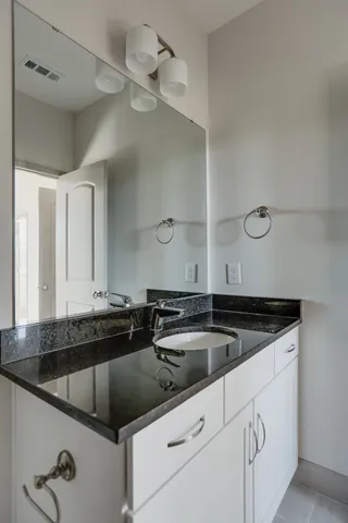 an aerial view of a city with lake view