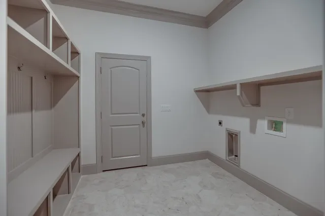 an aerial view of a houses with ocean view