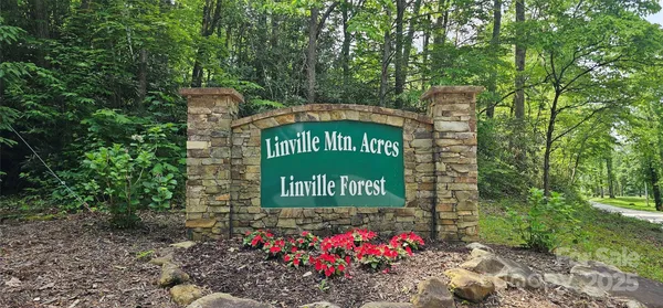 a sign on the side of the road