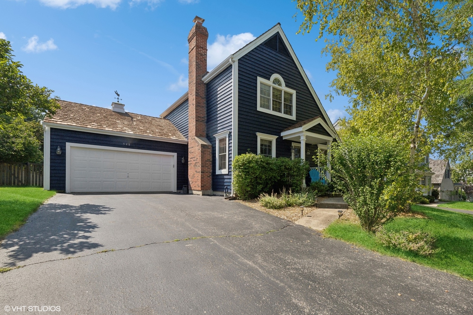 548 Long Hill Road Gurnee, IL 60031 - Photo 1 of 26 a front view of a house with a yard and garage