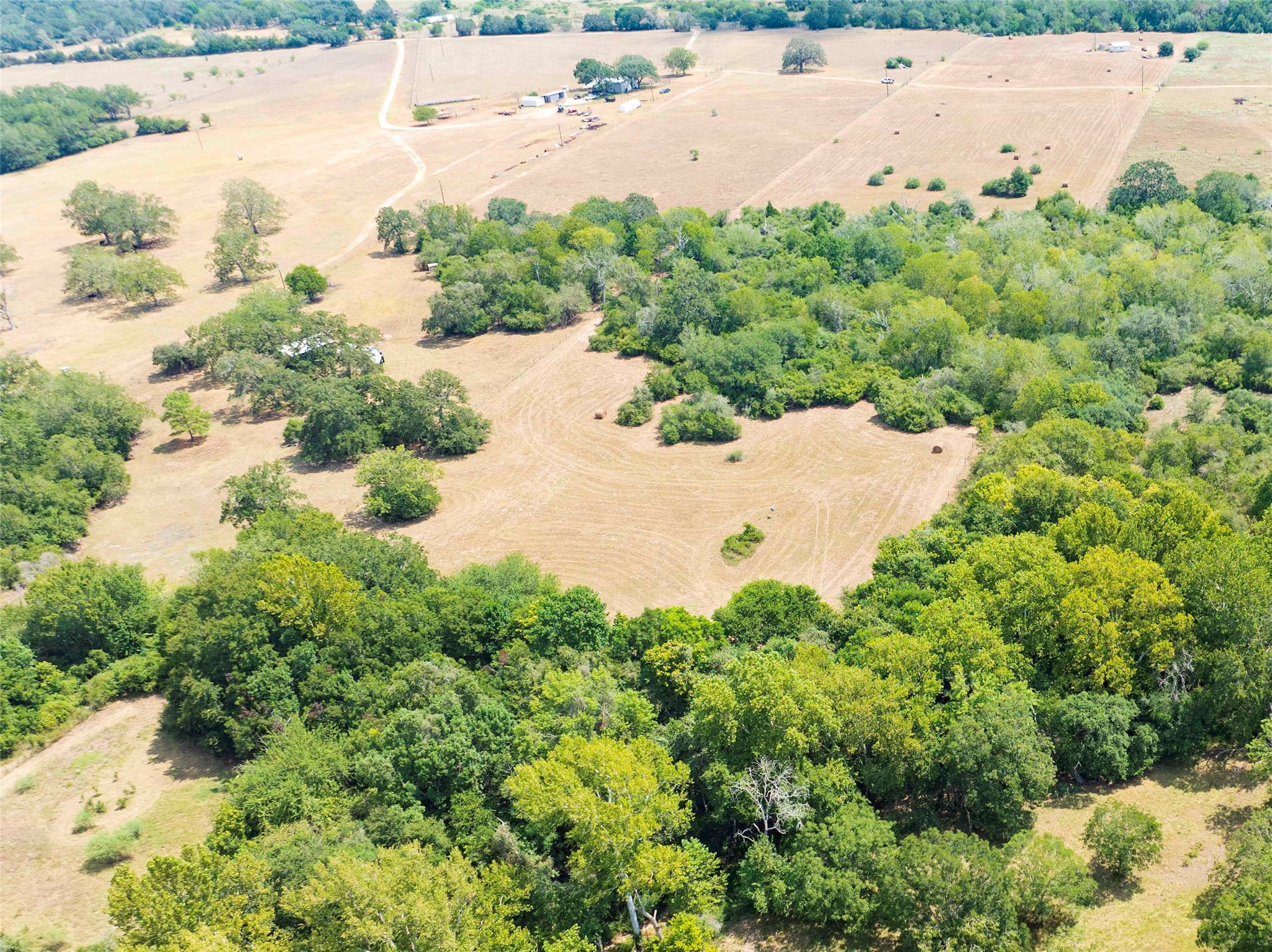710 County Road 211 Hallettsville, TX 77964 - Photo 11 of 29 an aerial view of beach and residential houses with outdoor space
