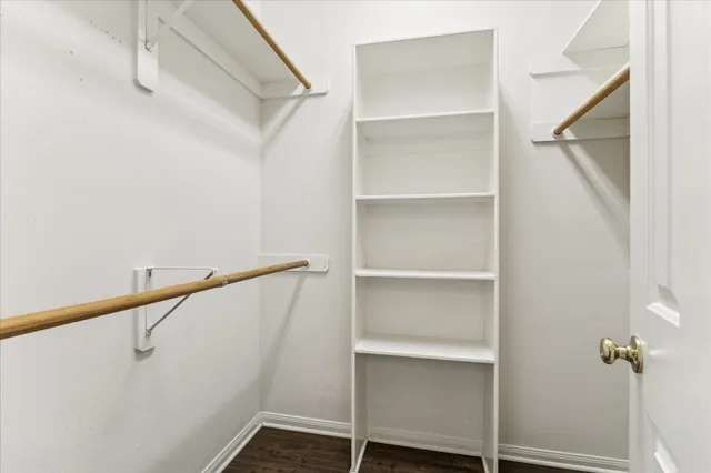 a view of an empty walk in closet