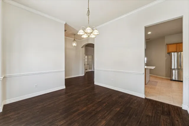 a view of a livingroom with wooden floor