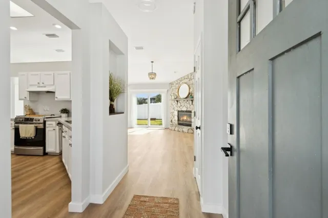 a view of a kitchen from the hallway