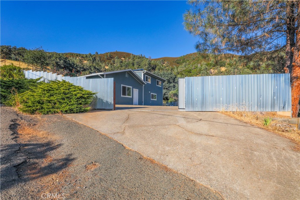 3273 Lee Street Nice, CA 95464 - Photo 18 of 50 a view of a house with a yard and mountain