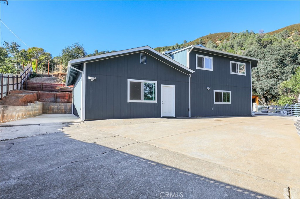 3273 Lee Street Nice, CA 95464 - Photo 2 of 50 a house with trees in the background