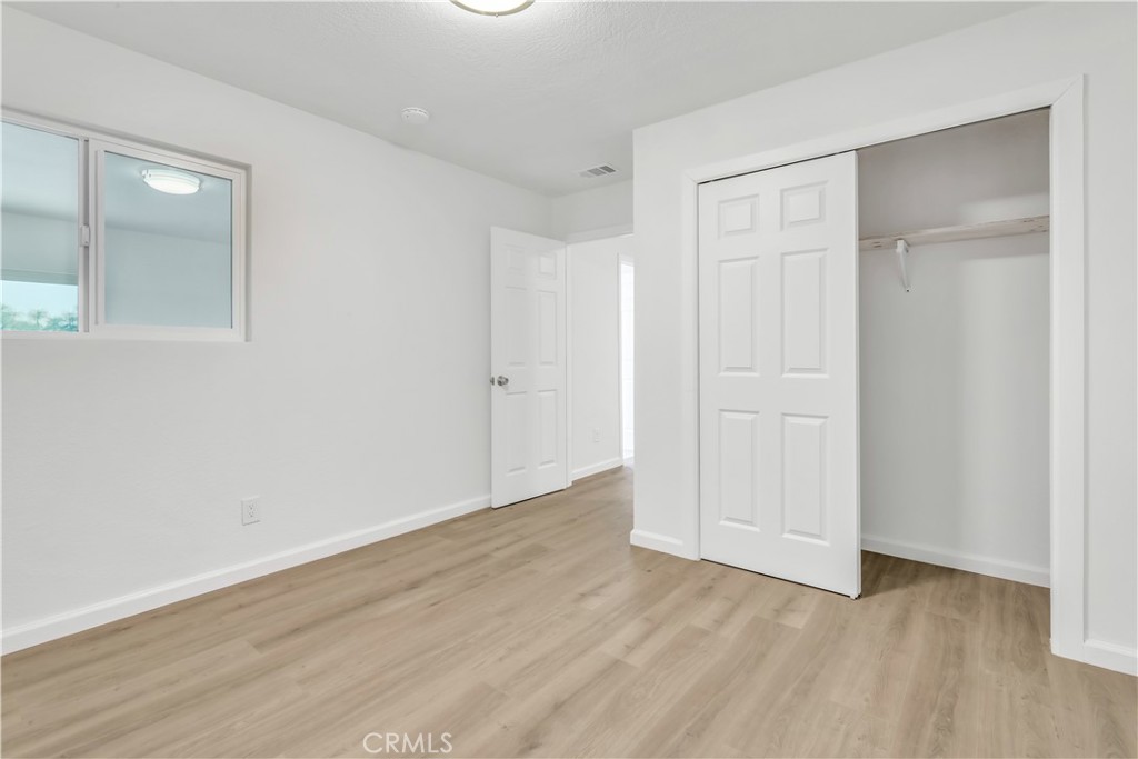 3273 Lee Street Nice, CA 95464 - Photo 25 of 50 a view of an empty room with wooden floor