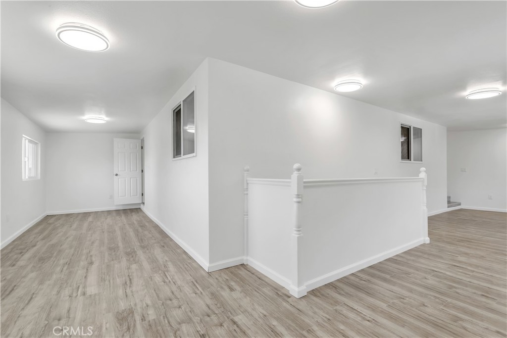 3273 Lee Street Nice, CA 95464 - Photo 30 of 50 a view of hallway with wooden floor