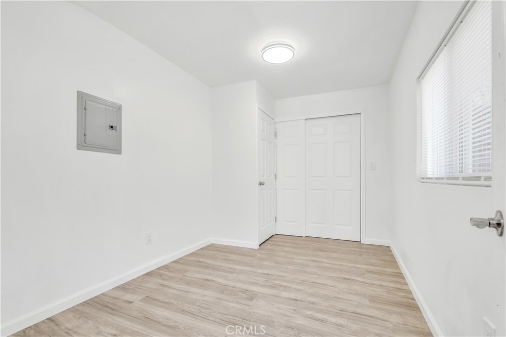 3273 Lee Street Nice, CA 95464 - Photo 35 of 50 a view of empty room with wooden floor