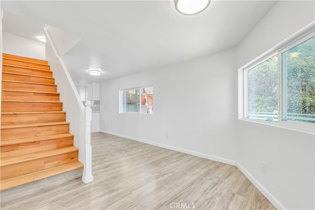 3273 Lee Street Nice, CA 95464 - Photo 40 of 50 a view of wooden floor and windows in a room