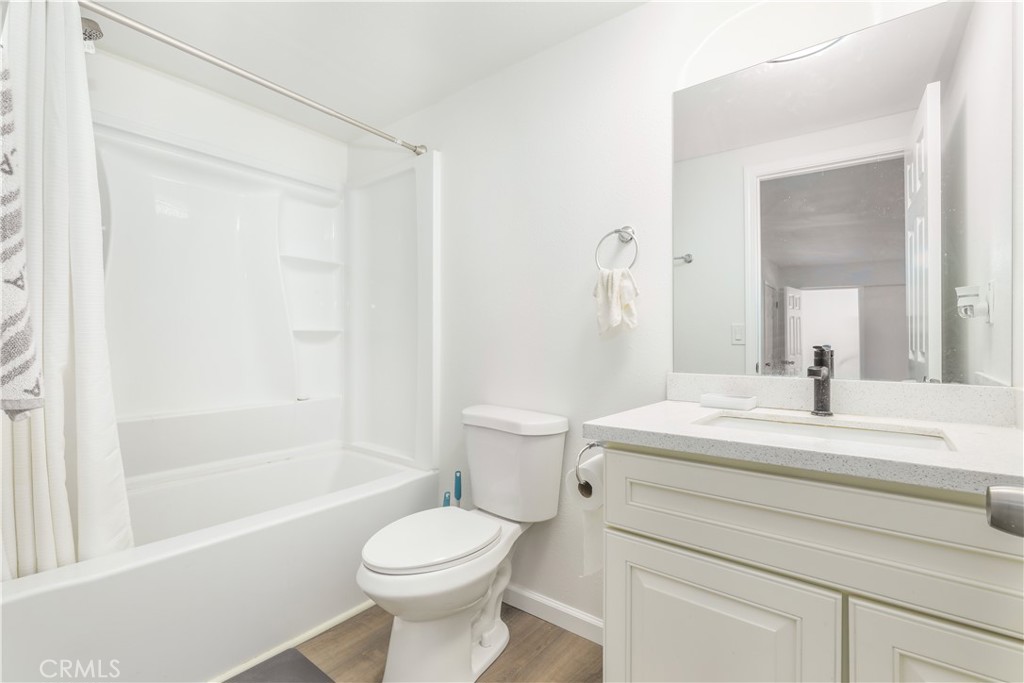 3273 Lee Street Nice, CA 95464 - Photo 45 of 50 a bathroom with a sink a toilet and a mirror