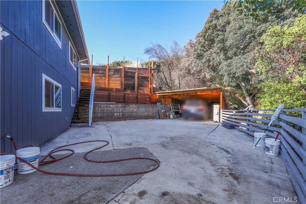 3273 Lee Street Nice, CA 95464 - Photo 9 of 50 a view of a house with backyard and trees