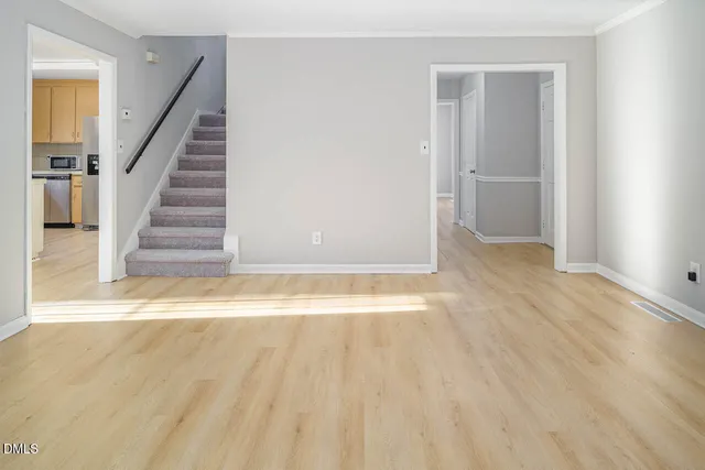 a view of entryway with wooden floor