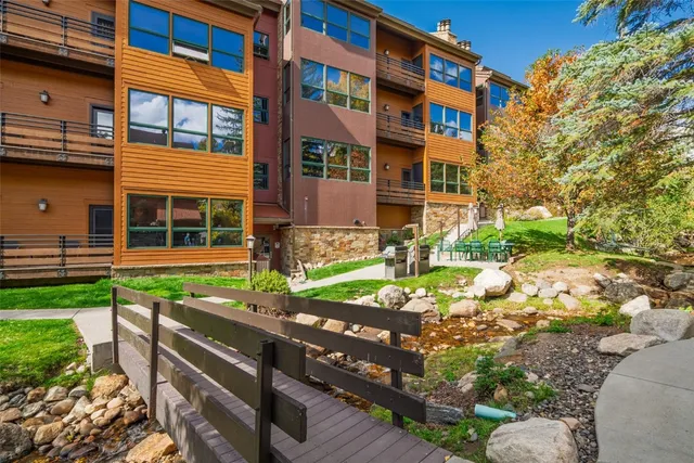 a front view of a building with garden