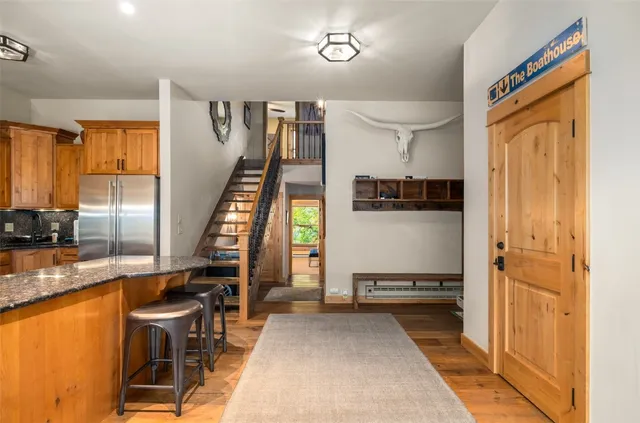 a view of a kitchen with furniture and a window