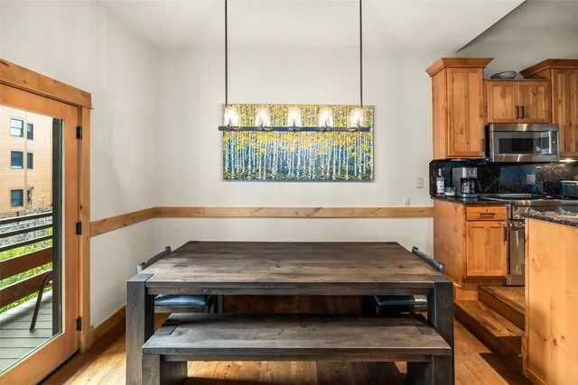 a stove top oven sitting inside of a kitchen
