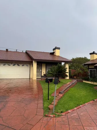 a view of a house with a patio