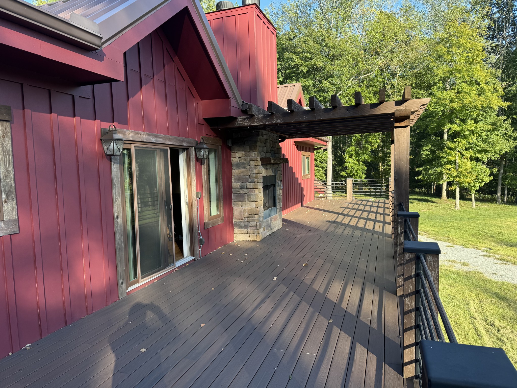4451 Airport Road Springfield, TN 37172 - Photo 25 of 31 a view of a house with backyard and wooden deck