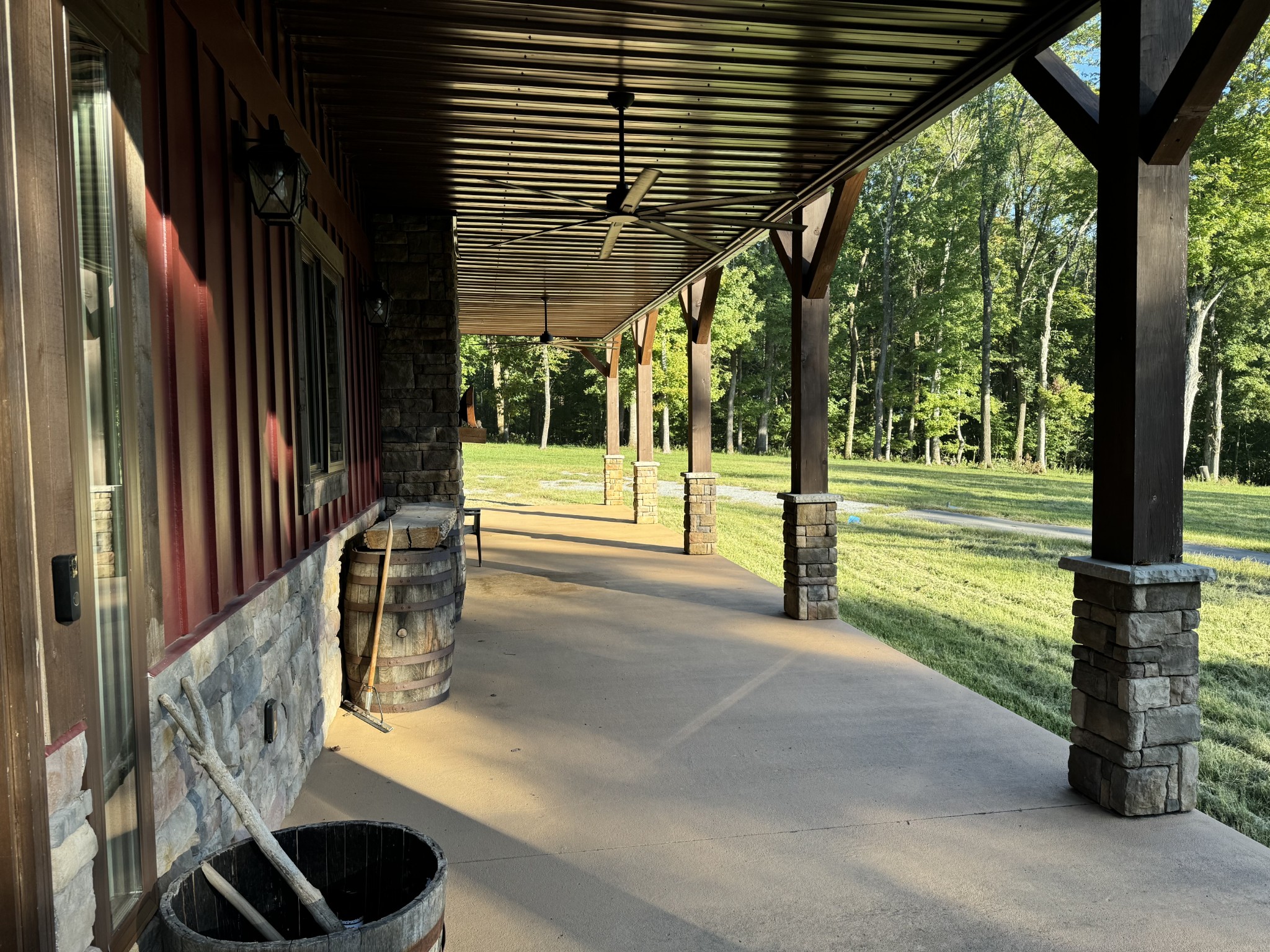 4451 Airport Road Springfield, TN 37172 - Photo 26 of 31 a view of a porch with wooden floor and stairs