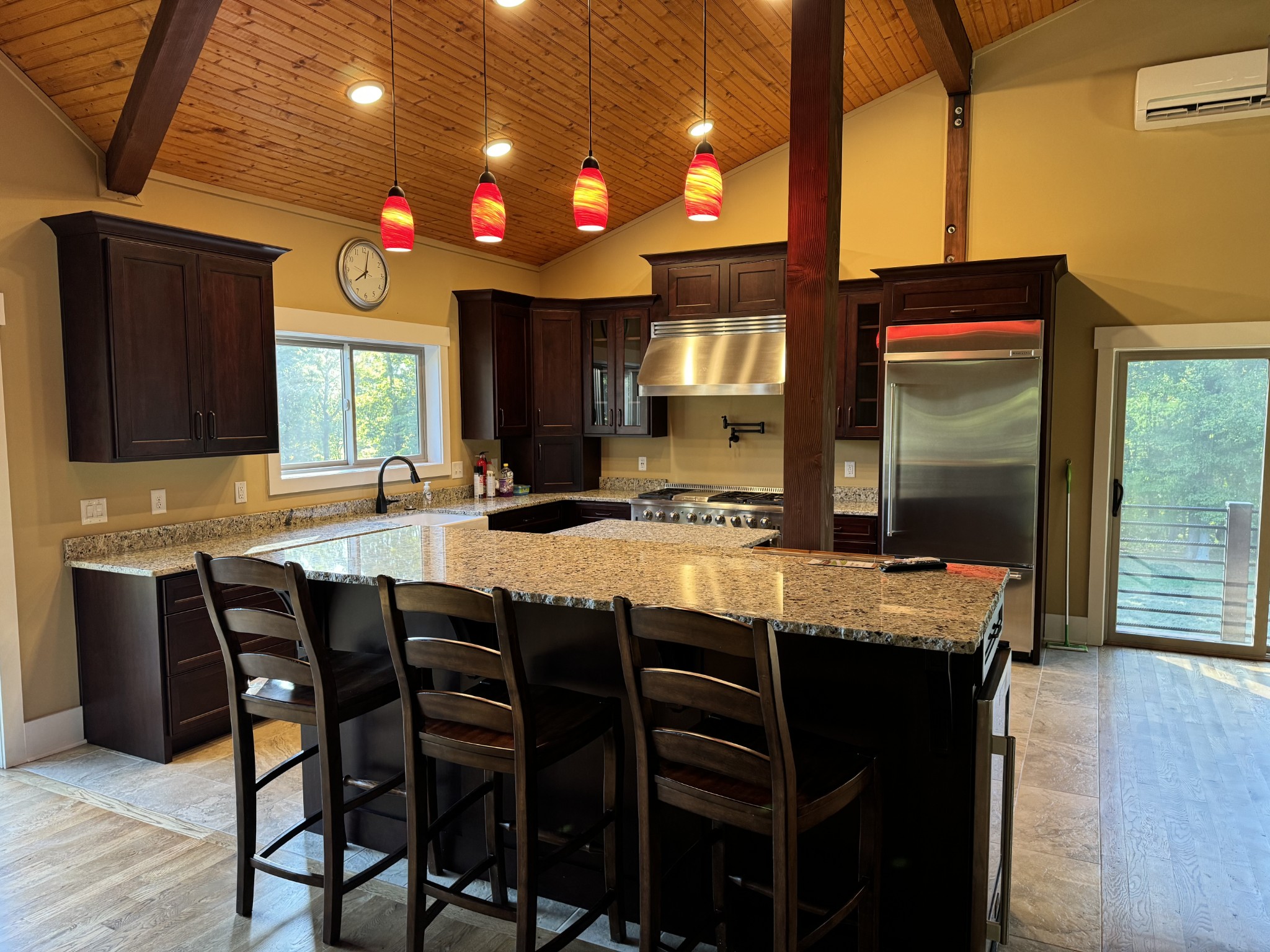 4451 Airport Road Springfield, TN 37172 - Photo 7 of 31 a kitchen with granite countertop kitchen island wooden cabinets and dining table