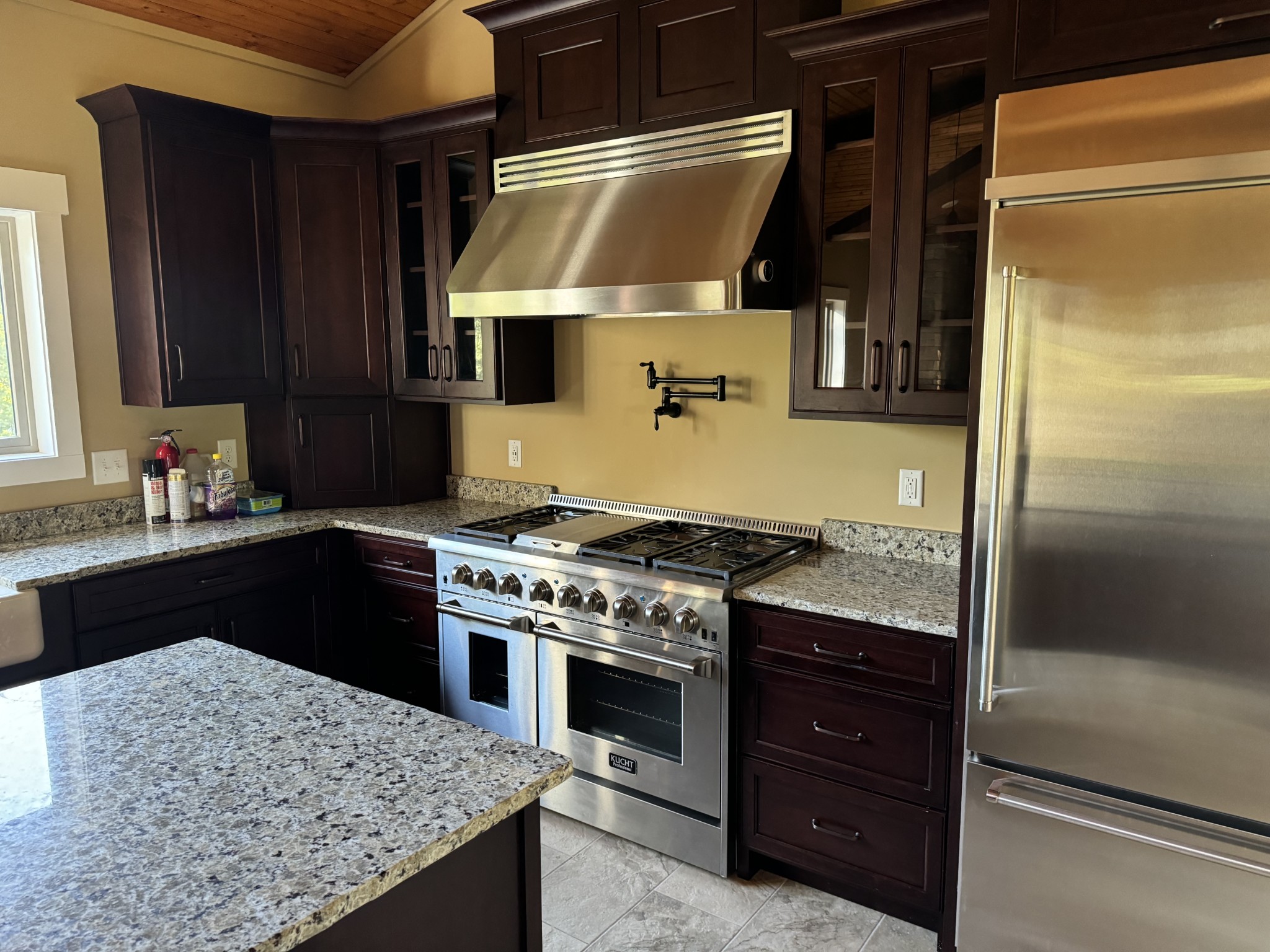 4451 Airport Road Springfield, TN 37172 - Photo 9 of 31 a kitchen with a stove and a refrigerator