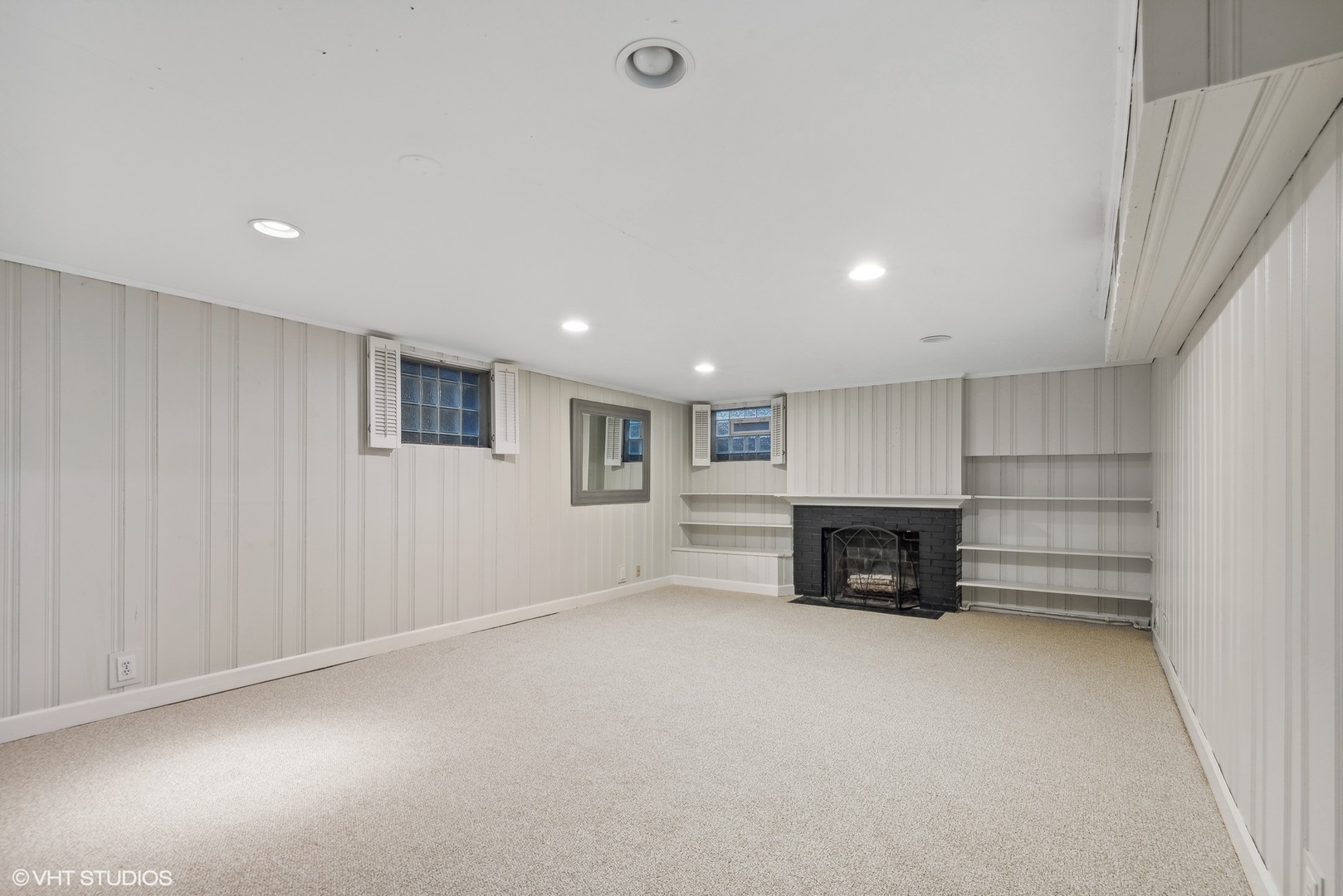 915 Pawnee Road Wilmette, IL 60091 - Photo 23 of 39 a view of empty room with a fireplace and cabinet