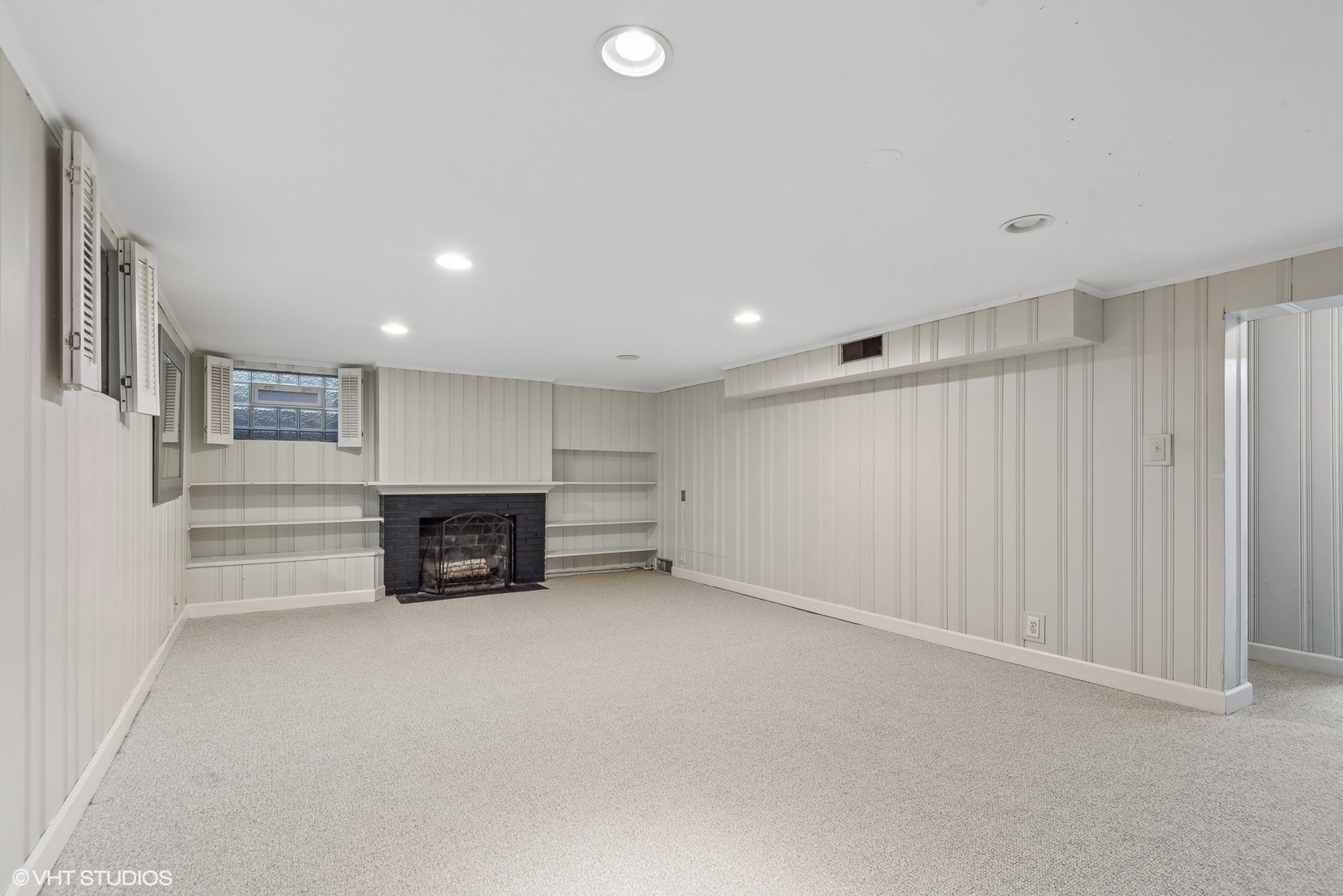 915 Pawnee Road Wilmette, IL 60091 - Photo 24 of 39 a view of an empty room with a fireplace