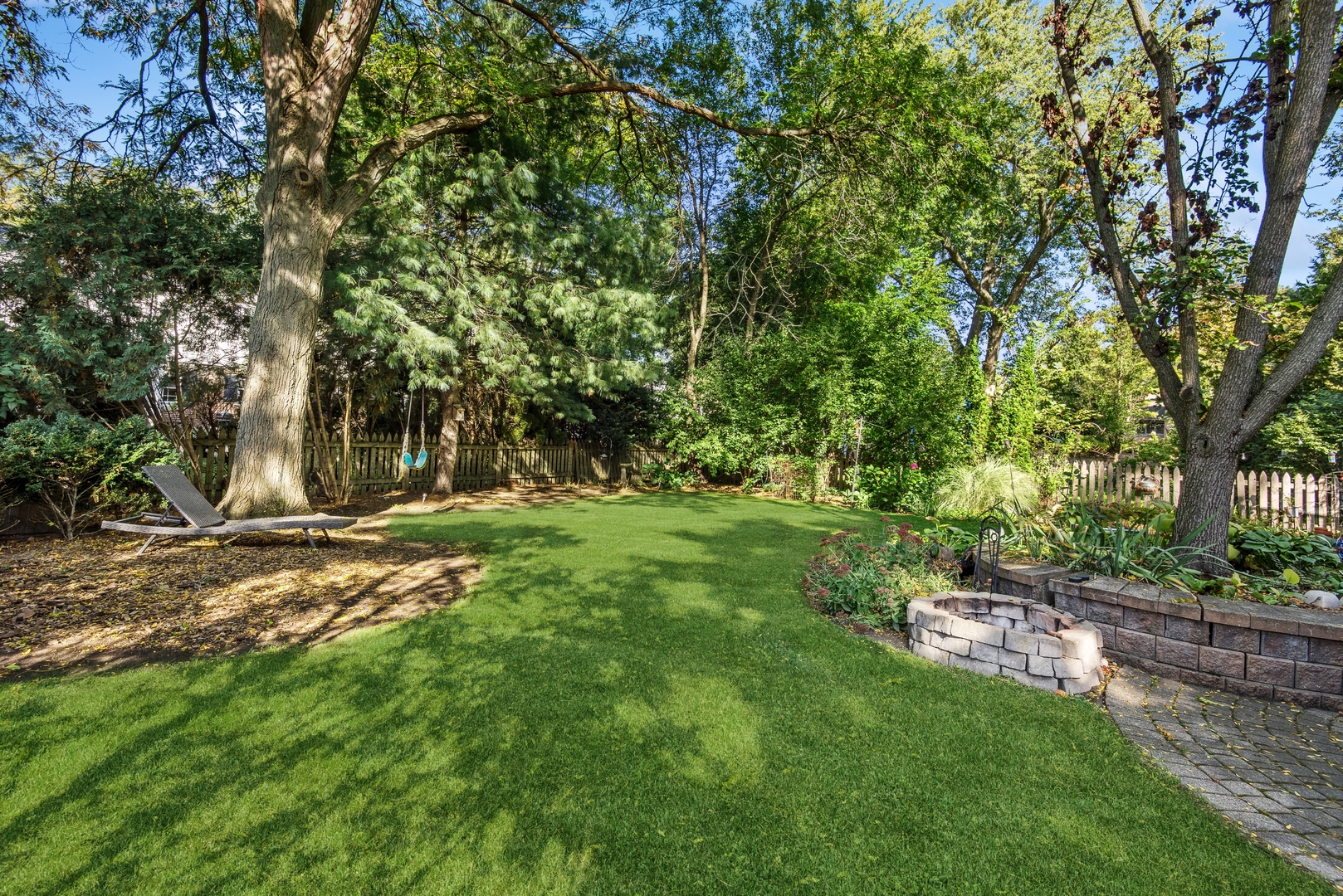 915 Pawnee Road Wilmette, IL 60091 - Photo 29 of 39 a view of a yard with a tree