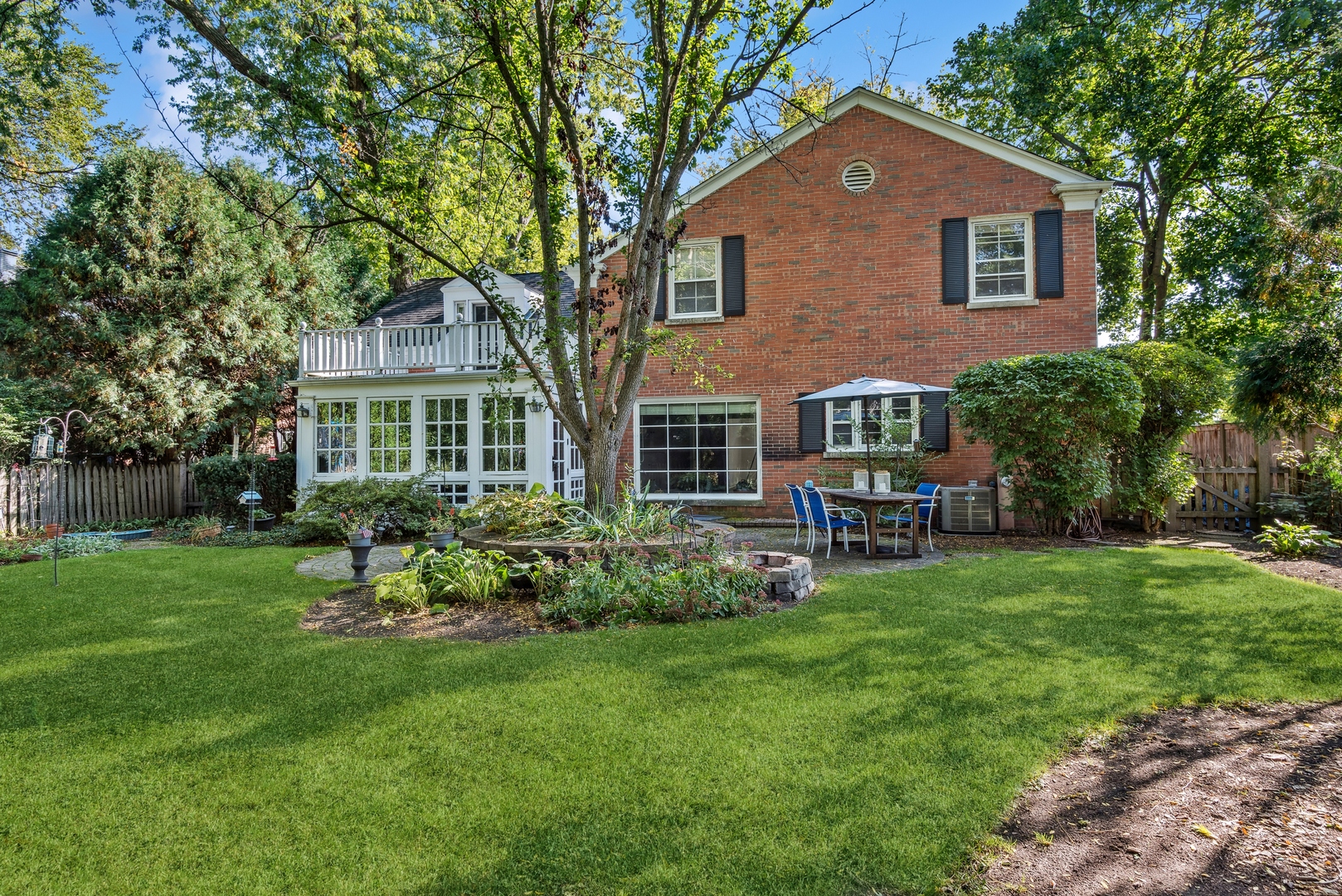 915 Pawnee Road Wilmette, IL 60091 - Photo 30 of 39 a house view with a garden space