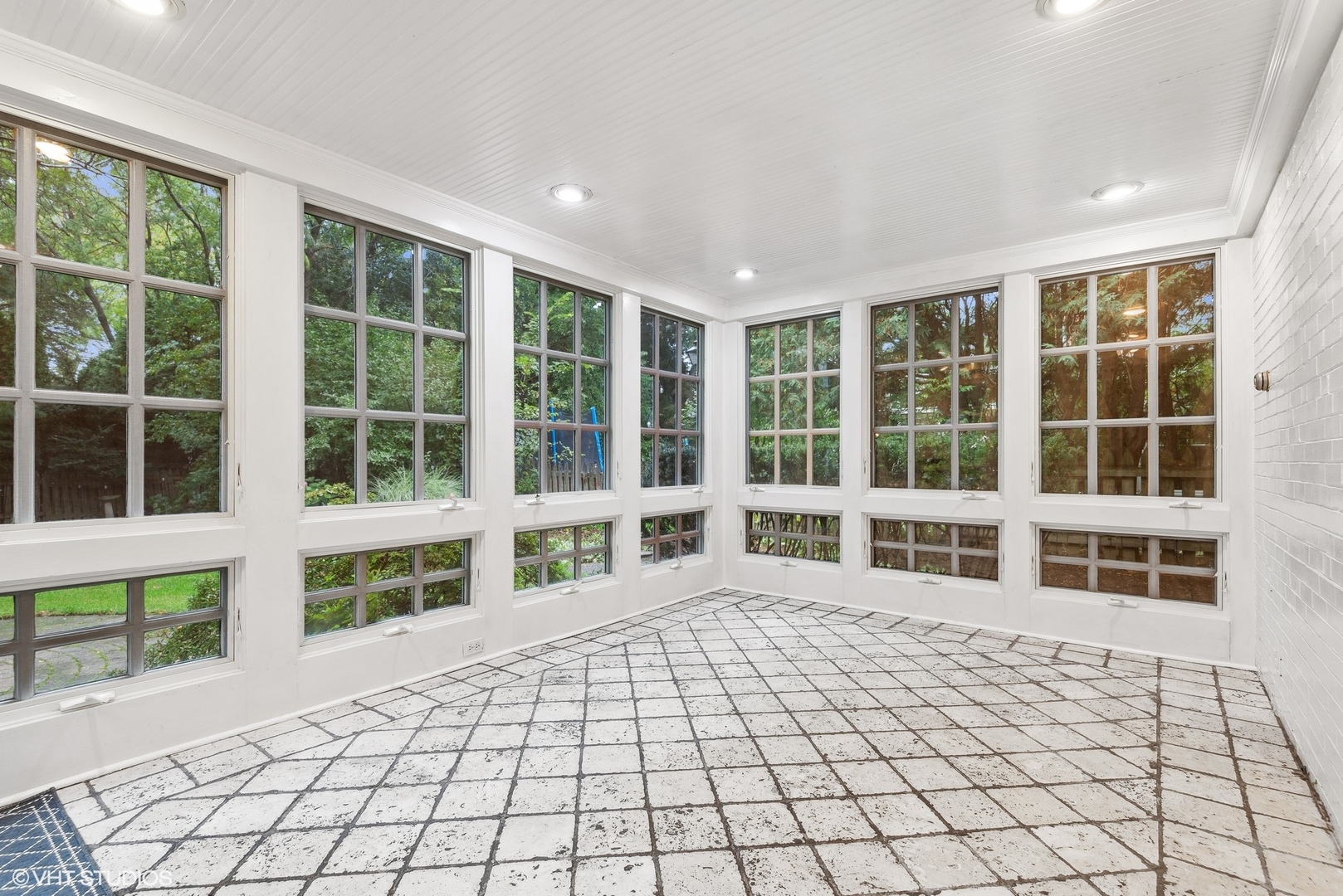 915 Pawnee Road Wilmette, IL 60091 - Photo 6 of 39 a view of empty room with windows