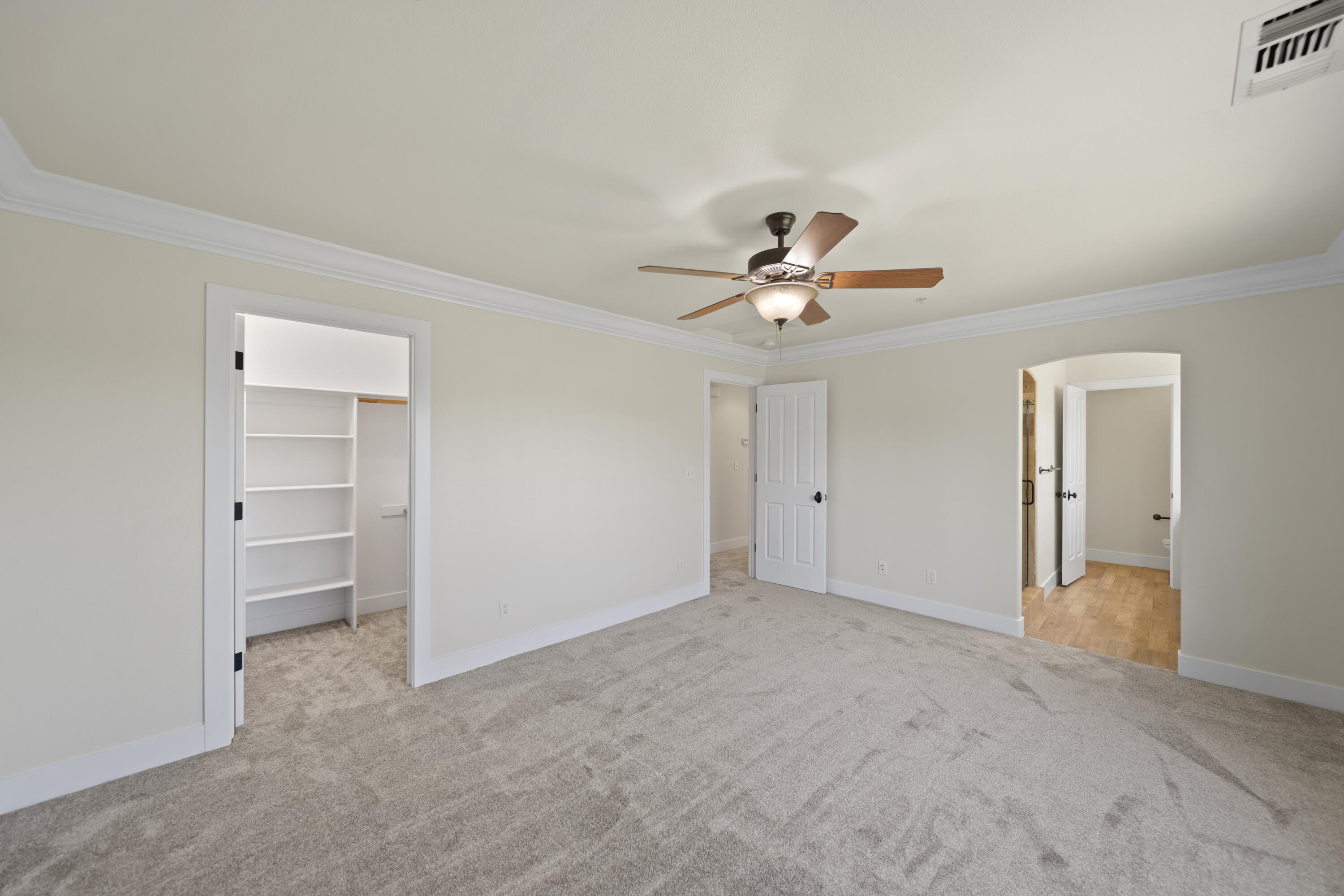 5592 Diamond Ridge Drive Redding, CA 96003 - Photo 17 of 45 a view of an empty room and chandelier fan