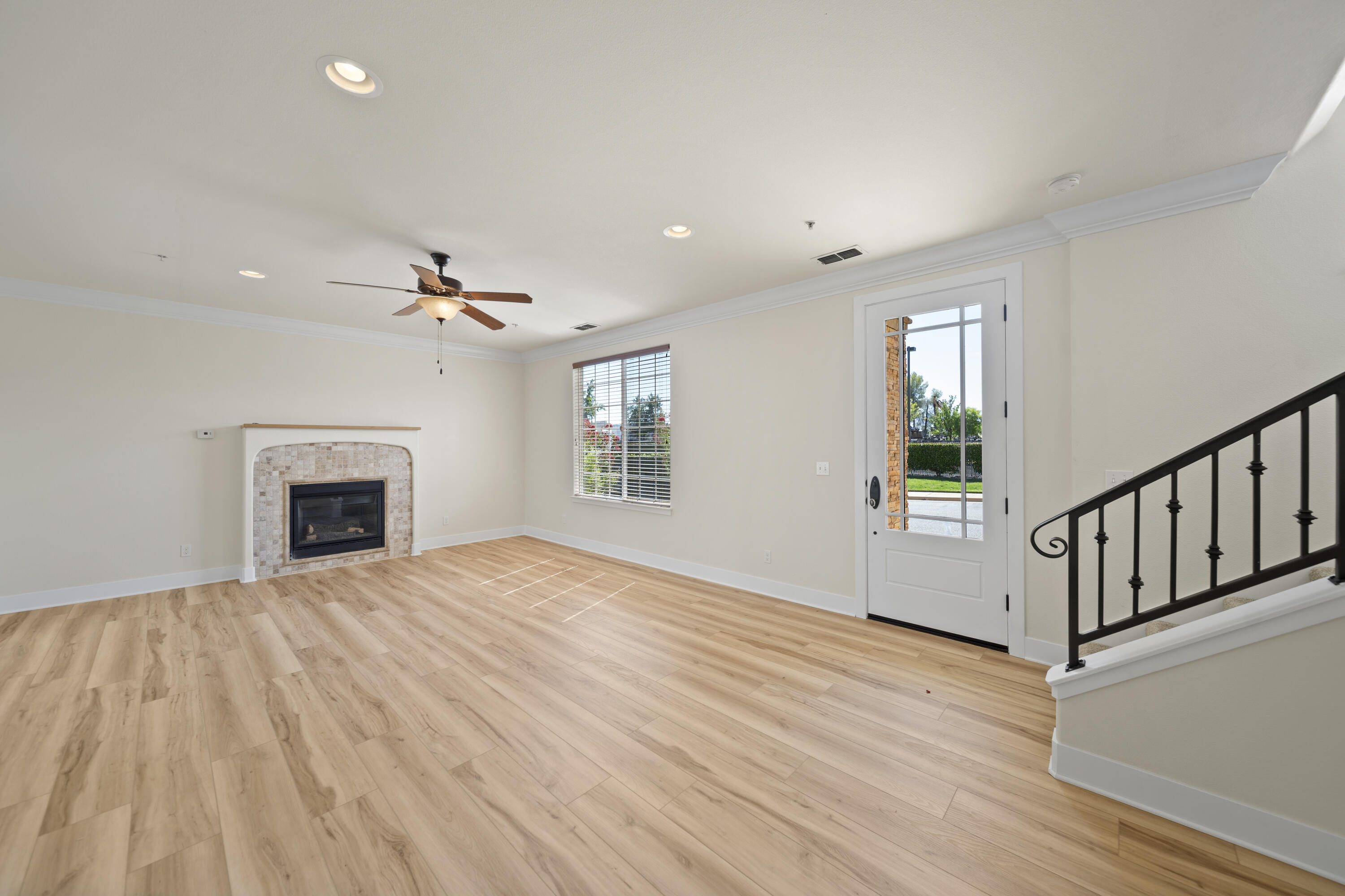 5592 Diamond Ridge Drive Redding, CA 96003 - Photo 3 of 45 a view of empty room with wooden floor and fireplace