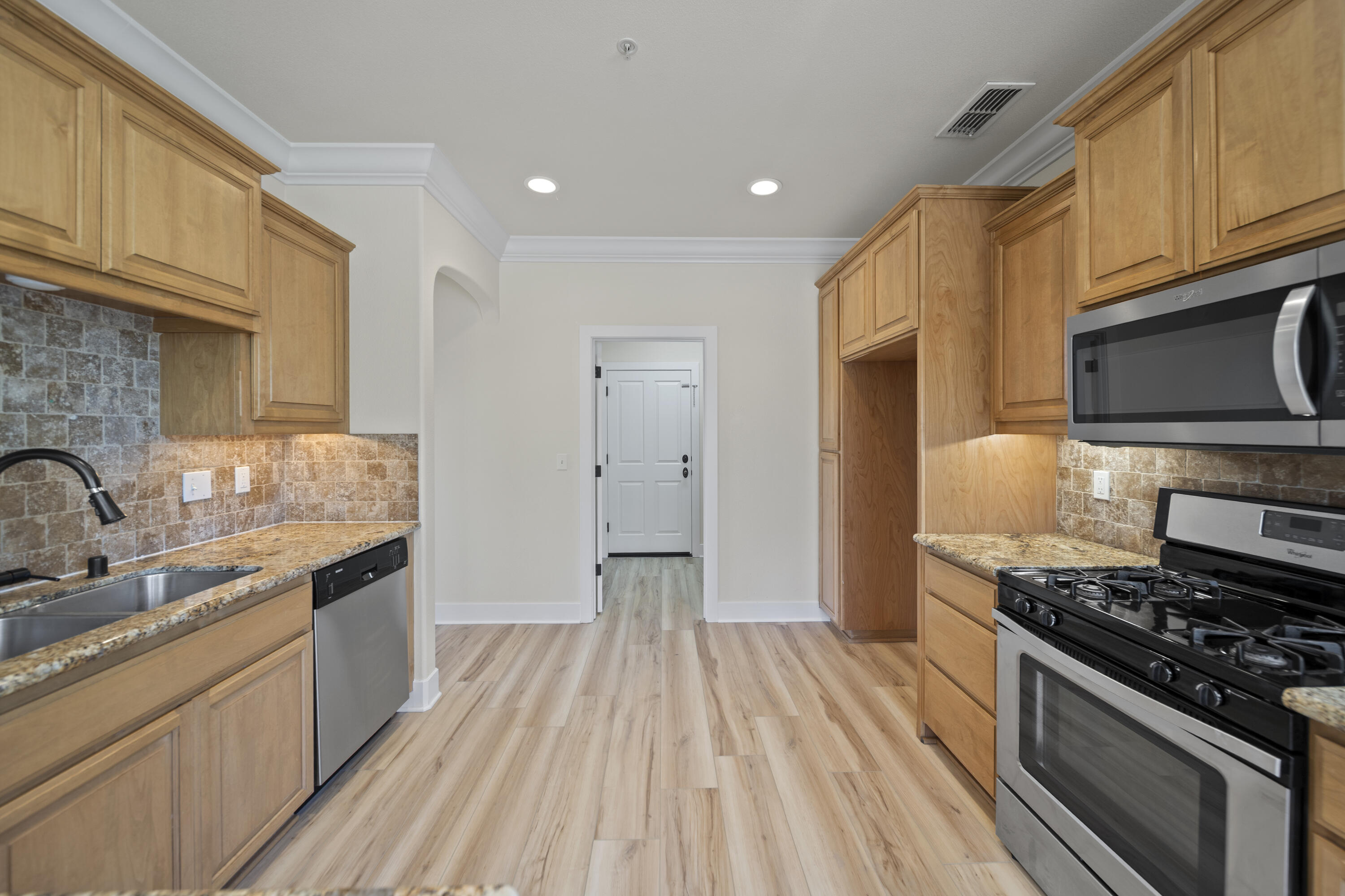 5592 Diamond Ridge Drive Redding, CA 96003 - Photo 8 of 45 a kitchen with stainless steel appliances granite countertop a stove and a sink