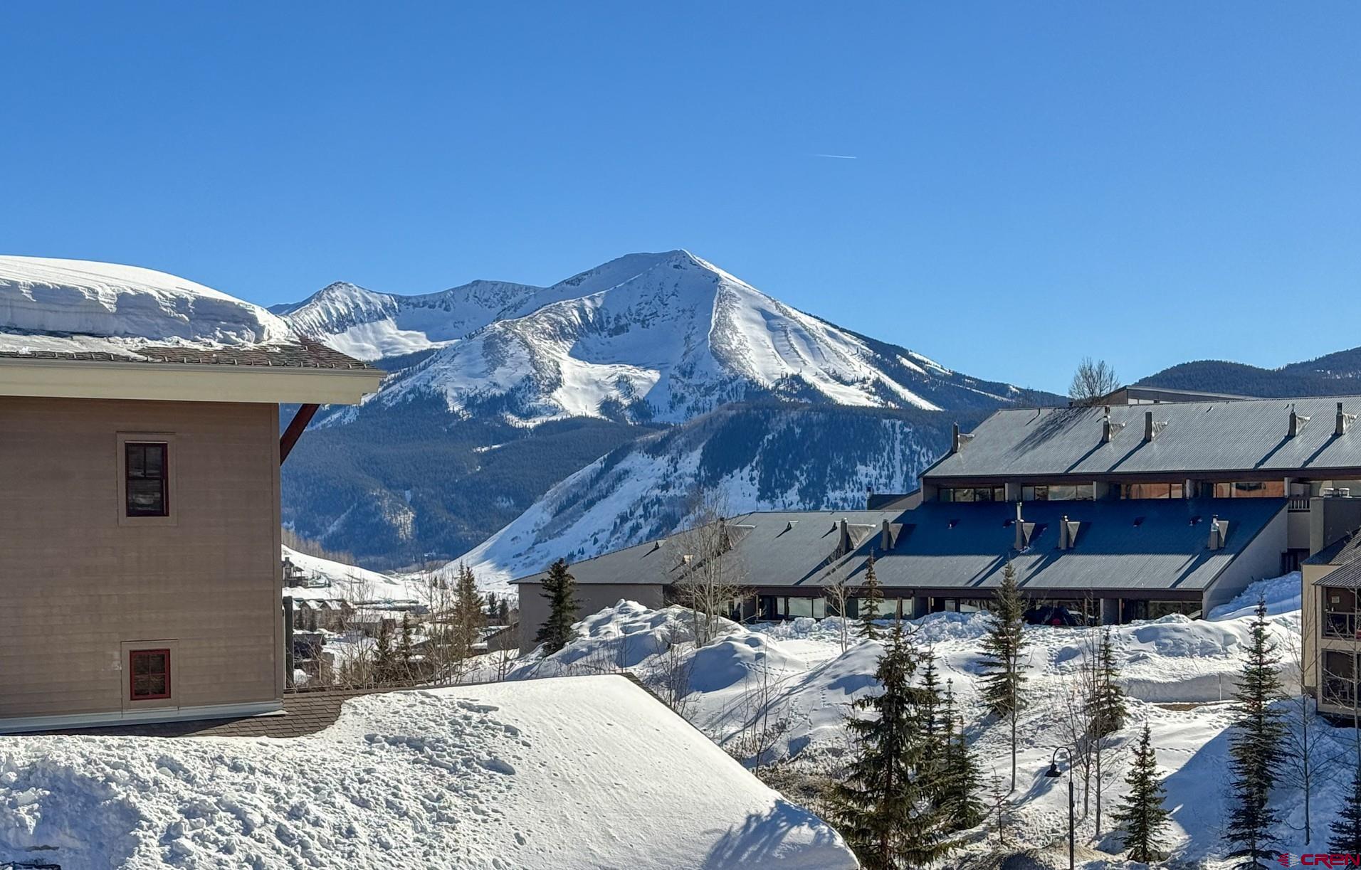 6 Emmons Road, Unit 463 Crested Butte, CO 81225 - Photo 8 of 21 a patio with table and chairs