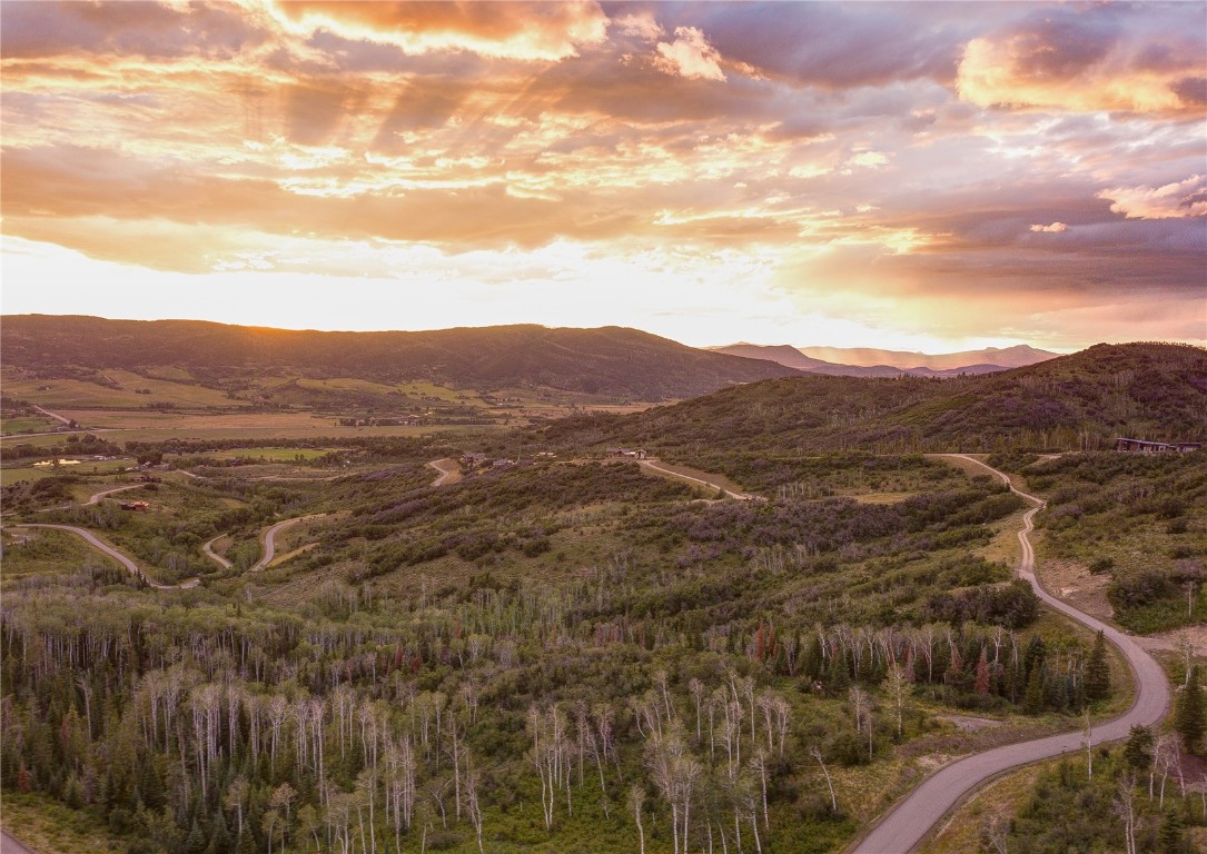 34905 Rockledge Road Steamboat Springs, CO 80487 - Photo 7 of 25 a view of a mountain in the distance in a field