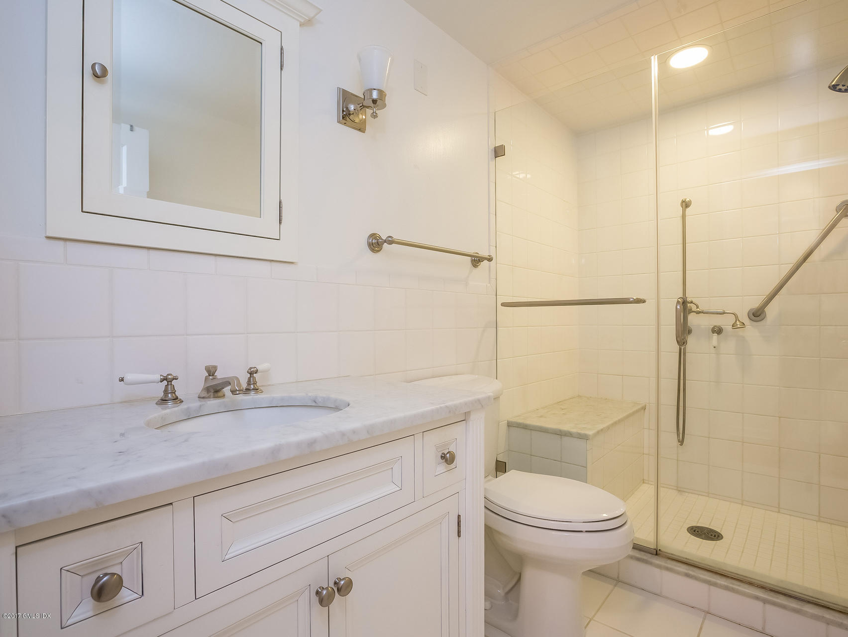 1 Elizabeth Lane Riverside, CT 06878 - Photo 11 of 26 a bathroom with a sink a toilet and shower