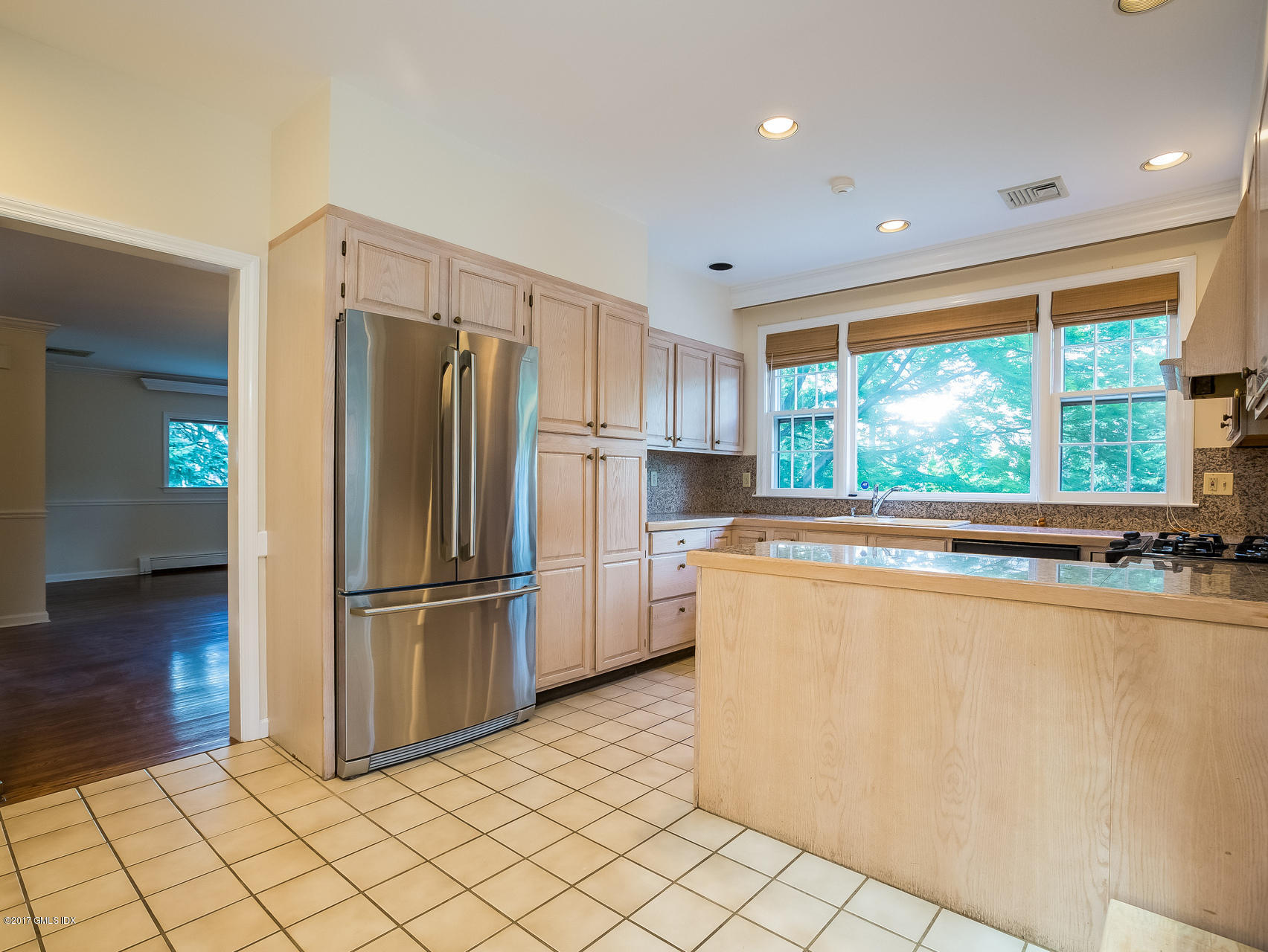 1 Elizabeth Lane Riverside, CT 06878 - Photo 4 of 26 a kitchen with stainless steel appliances a refrigerator and a stove