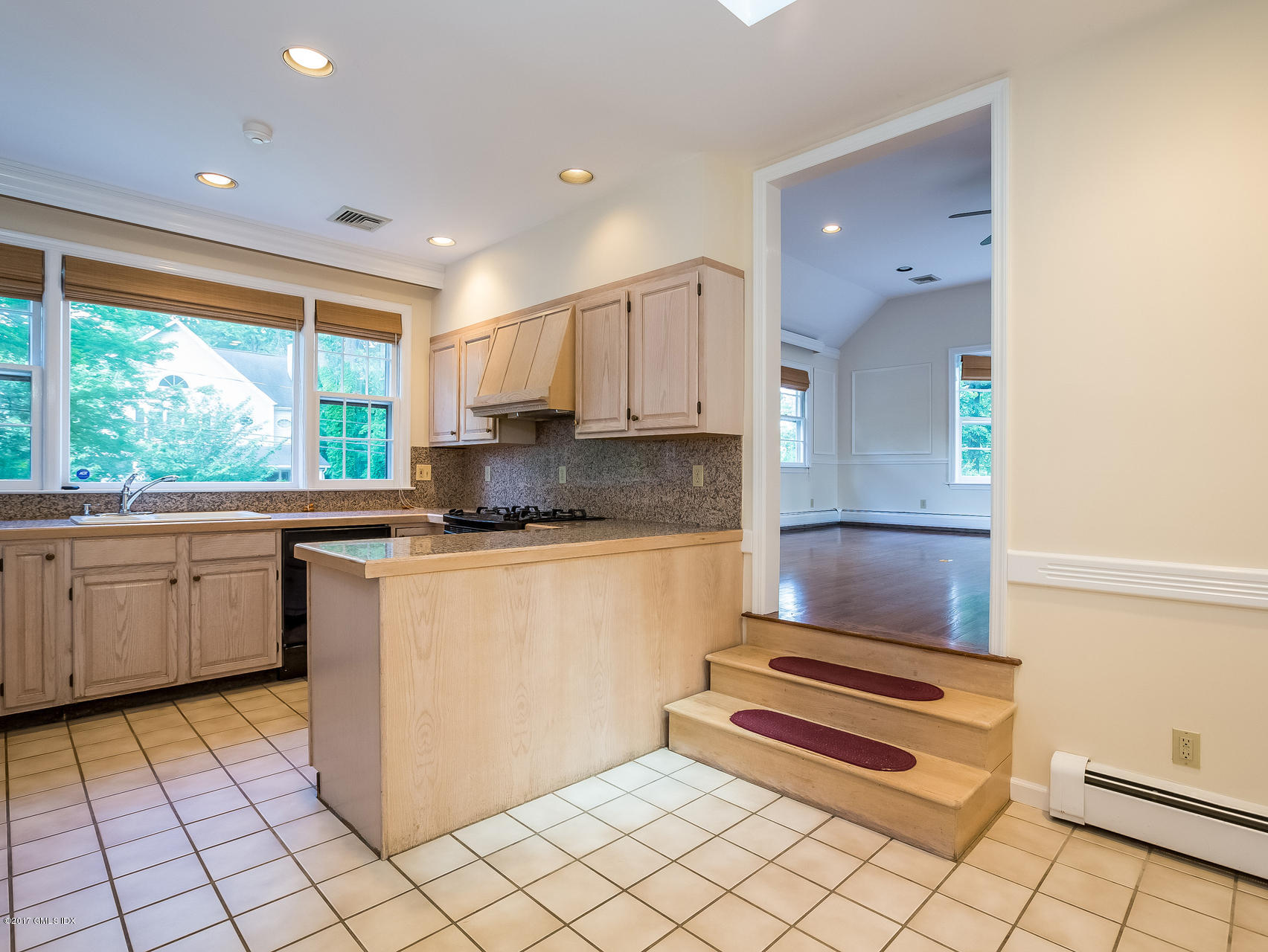 1 Elizabeth Lane Riverside, CT 06878 - Photo 6 of 26 a kitchen with a sink cabinets and window
