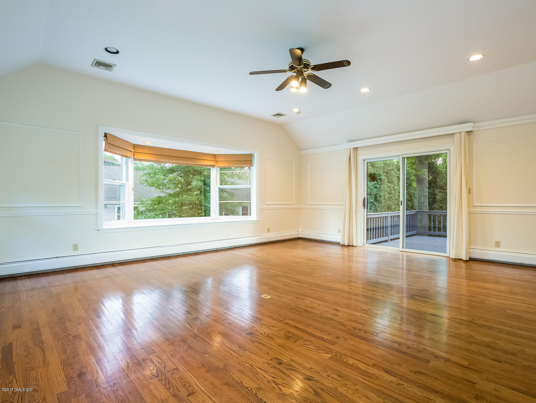 1 Elizabeth Lane Riverside, CT 06878 - Photo 7 of 26 a view of an empty room with wooden floor and a window