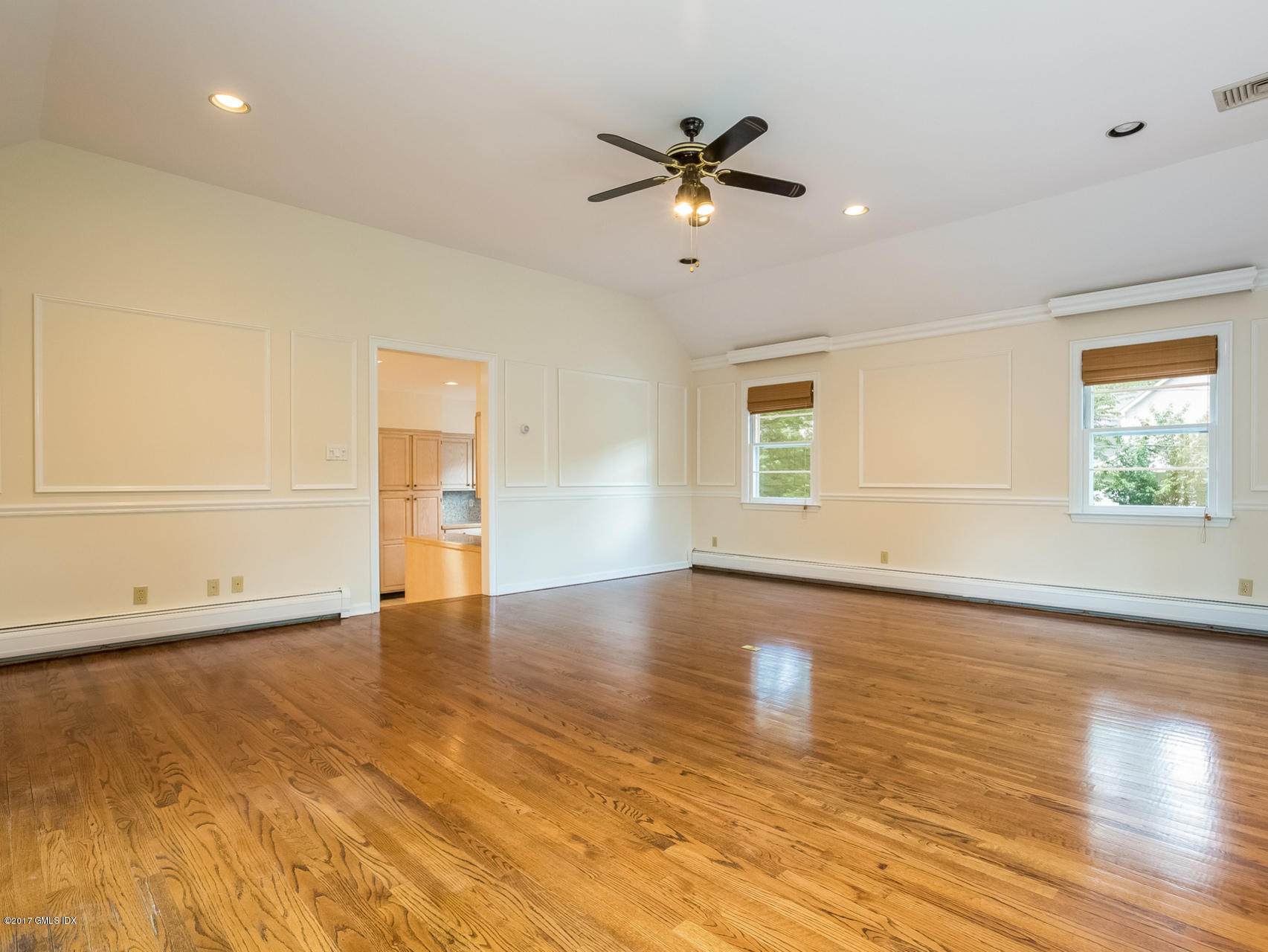 1 Elizabeth Lane Riverside, CT 06878 - Photo 8 of 26 a view of an empty room with wooden floor and a window